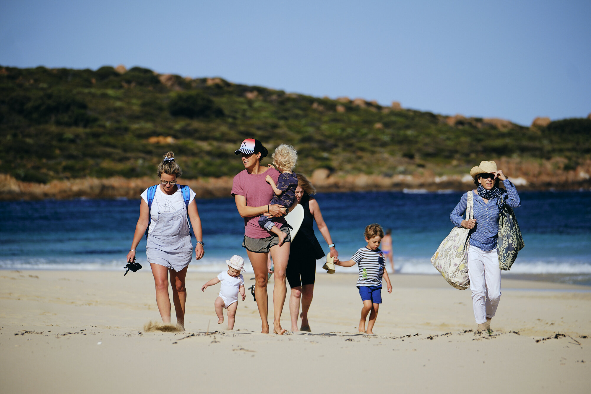 The Surfing Mums head to the surf at Smiths Beach, WA